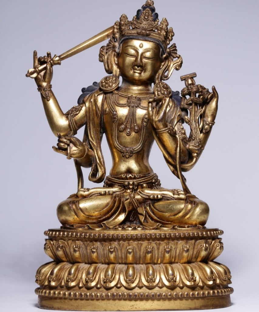 A Exquisite Gilt Bronze Statue of Manjusri Ornament: A Exquisite Gilt Bronze Statue of Manjusri Ornament,Qing Dynasty, China,Size:9.6inx5.9inx4.1in,Weight:3182g