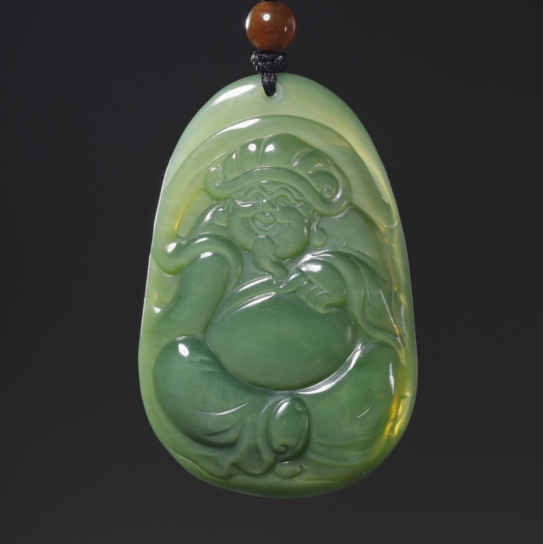 A Exquisite Hotan Jasper Buddha Brand: A Exquisite Hotan Jasper Buddha Brand,Qing Dynasty, China,Size:2inx1.3inx0.4in,Weight:23.2g 和田碧玉佛牌,中国清代