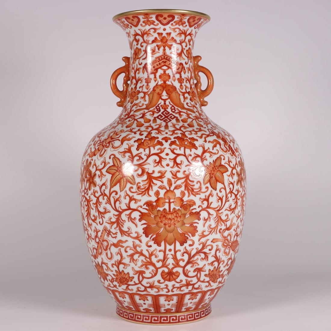 A Exquisite Iron-Red Painted Gold Interlocking Lotus Eight Treasures Pattern Double-Ears Vase: A Exquisite Iron-Red Painted Gold Interlocking Lotus Eight Treasures Pattern Double-Ears Vase,Qing Dynasty, China,Qianlong Six-character Mark,Size:12inx3.9inx6.7inx3.9in