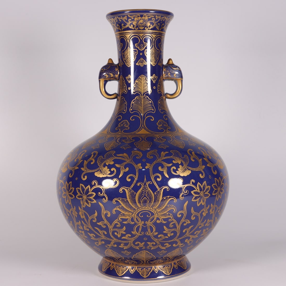 A Exquisite Ji Blue Glazed Painted Gold Interlocking Lotus Flower Pattern Double-Ears Vase: A Exquisite Ji Blue Glazed Painted Gold Interlocking Lotus Flower Pattern Double-Ears Vase,Qing Dynasty, China,Qianlong Six-character Mark,Size:12.2inx3.1inx8.3inx4.5in