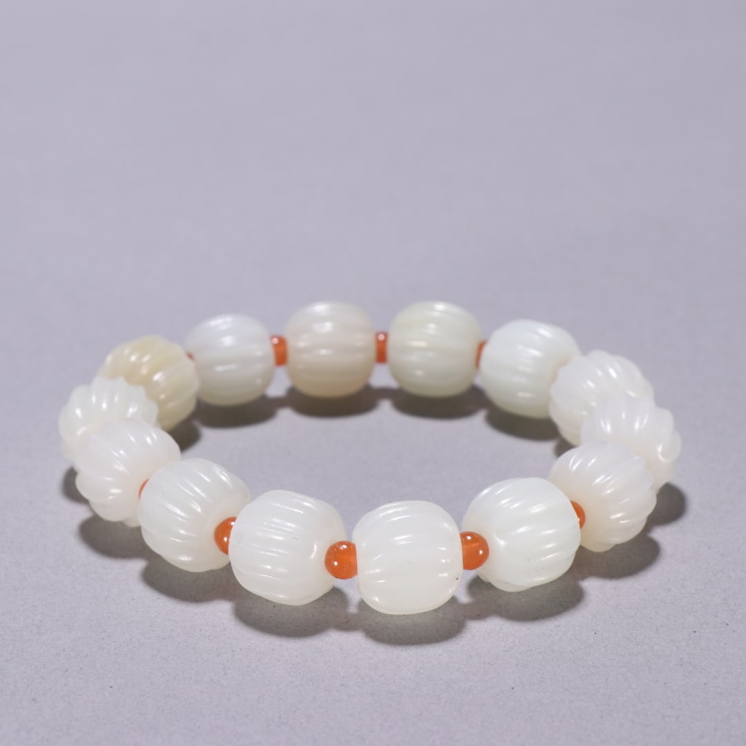 A Exquisite Hotan Jade Bracelets: A Exquisite Hotan Jade Bracelets,Qing Dynasty, China,Size:0.6in,Weight:77.5g 和田玉手串,中国清代