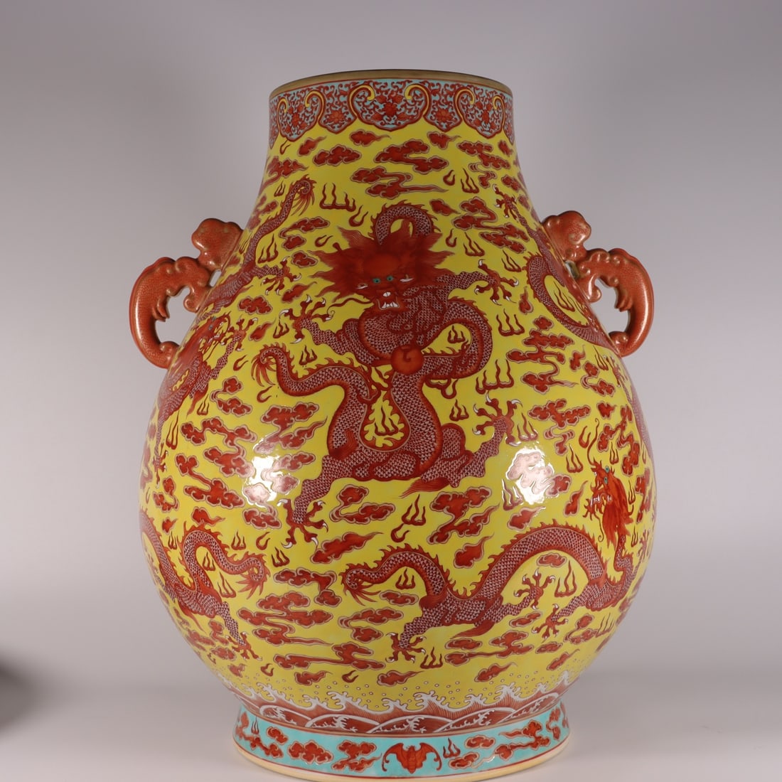 A Exquisite Yellow Ground Iron-Red Painted Gold Dragon Pattern Double-Ears Vase: A Exquisite Yellow Ground Iron-Red Painted Gold Dragon Pattern Double-Ears Vase,Qing Dynasty, China,Qianlong Six-character Mark,Size:17.5inx6.6inx10in