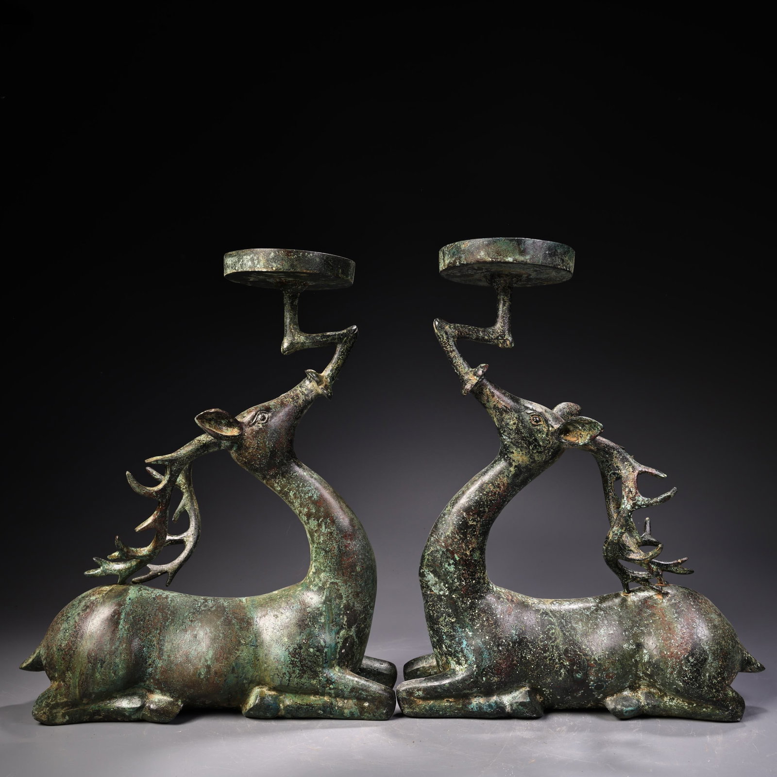 A pair of Exquisite Bronze Sika Deer Oil Lamp: A pair of Exquisite Bronze Sika Deer Oil Lamp,Han Dynasty, China,Size:12.6inx9.8in ,Weight:2300g 一对青铜鹿油灯,中国汉代