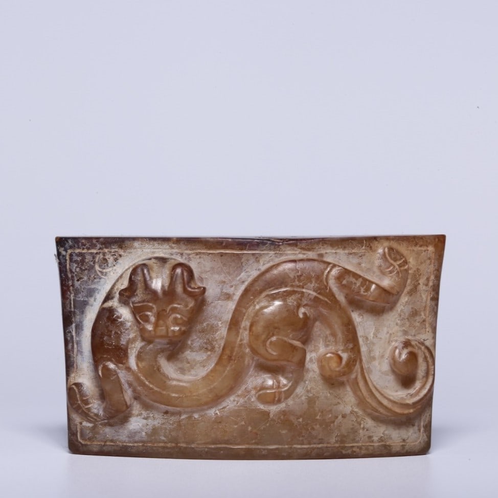 A Exquisite Hotan Jade Dragon Sword Decoration: A Exquisite Hotan Jade Dragon Sword Decoration,Qing Dynasty, China,Size:2.3inx0.8inx1.3in,Weight:68.3g 和田玉龙剑饰,中国清代