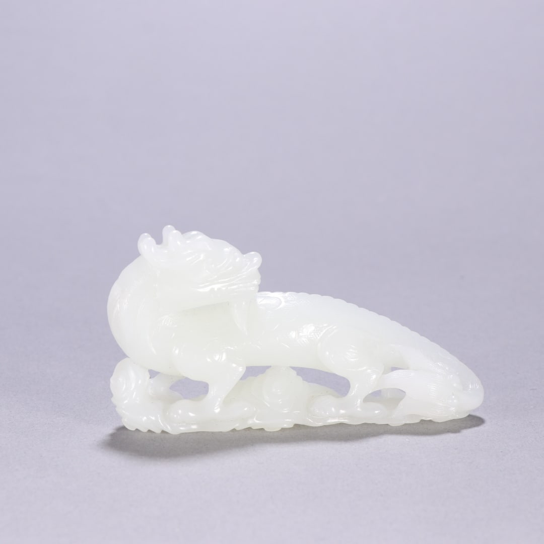 A Exquisite Hotan Jade Dragon Ornament: A Exquisite Hotan Jade Dragon Ornament,Qing Dynasty, China,Size:1.9inx3.6in,Weight:78.6g 和田玉龙摆件,中国清代