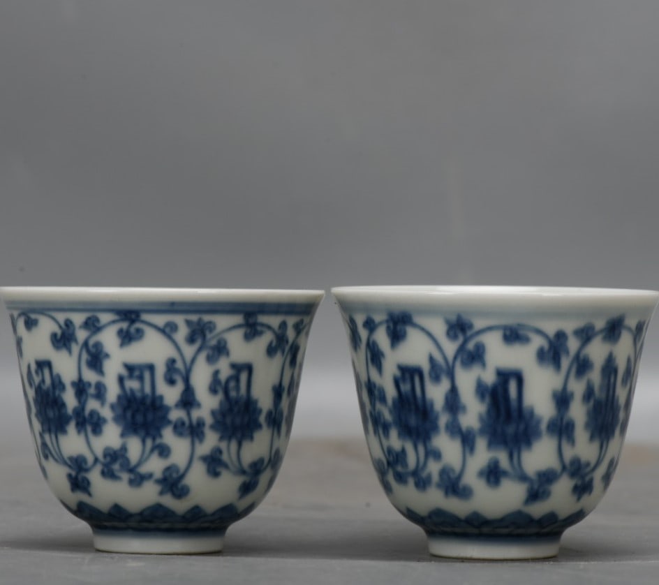 A Pair of Exquisite Blue And White Interlocking Lotus Pattern Cup: A Pair of Exquisite Blue And White Interlocking Lotus Pattern Cup,Ming Dynasty, China,Chenghua Six-character Mark,Size:2.2inx2.8inx1in 一对青花缠枝莲纹&