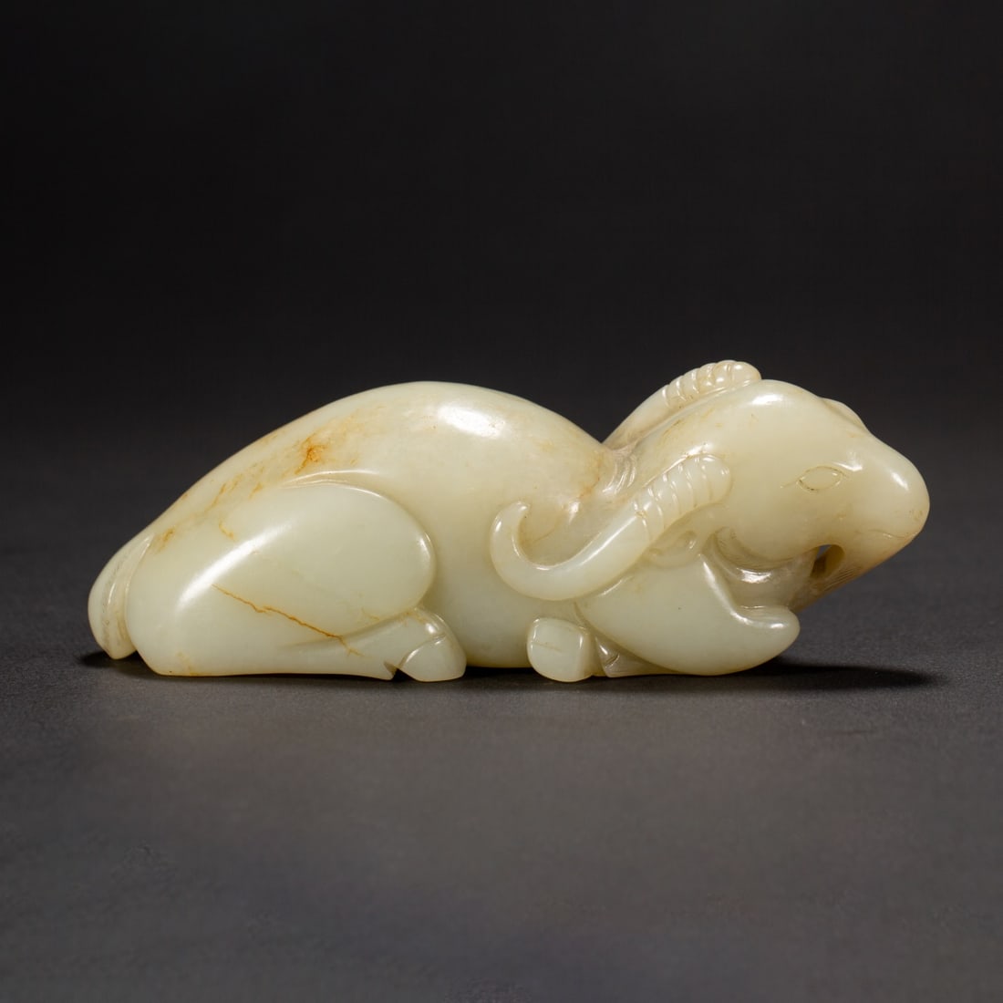 A Exquisite Hotan Jade Auspicious Beast Ornament: A Exquisite Hotan Jade Auspicious Beast Ornament,Qing Dynasty, China,Size:5.7inx1.8in,Height:2.2in,Weight:470g 和田玉瑞兽摆件,中国清代