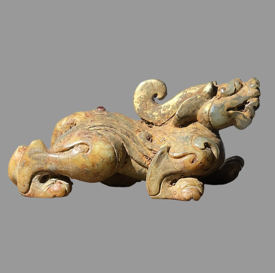 A Exquisite Hetian Jade Gilt Auspicious Beast Ornament: A Exquisite Hetian Jade Gilt Auspicious Beast Ornament,Han Dynasty, China,Size:5.5inx2.6inx2.2in