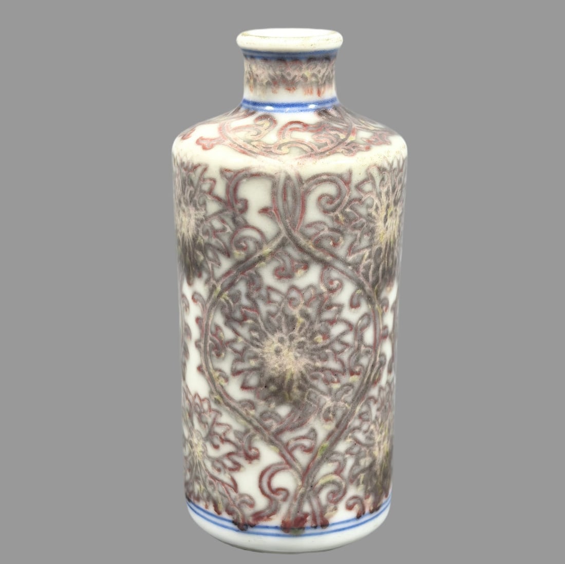 A Exquisite Underglaze-Red Lotus Pattern Snuff Bottle: A Exquisite Underglaze-Red Lotus Pattern Snuff Bottle,Qing Dynasty, China,Daoguang Six-character Mark,Size:3.6inx0.7inx1.8inx1.4in 釉里红缠枝莲纹鼻Ġ