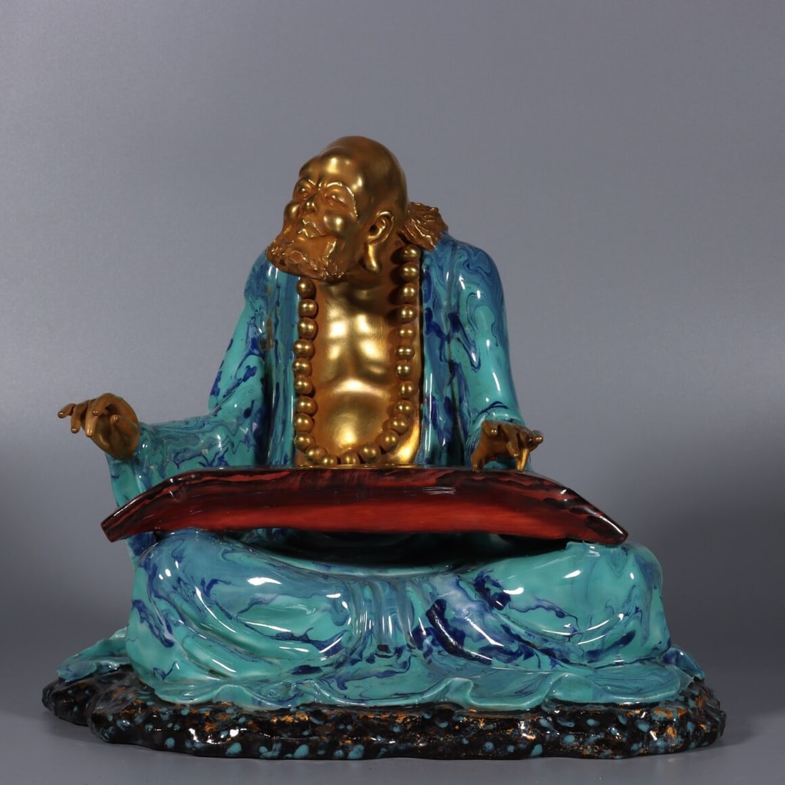 A Exquisite Robin's-Egg-Glazed Painted Gold Arhat Ornament: A Exquisite Robin's-Egg-Glazed Painted Gold Arhat Ornament,Qing Dynasty, China,Qianlong Six-character Mark,Size:7.9inx8.9in