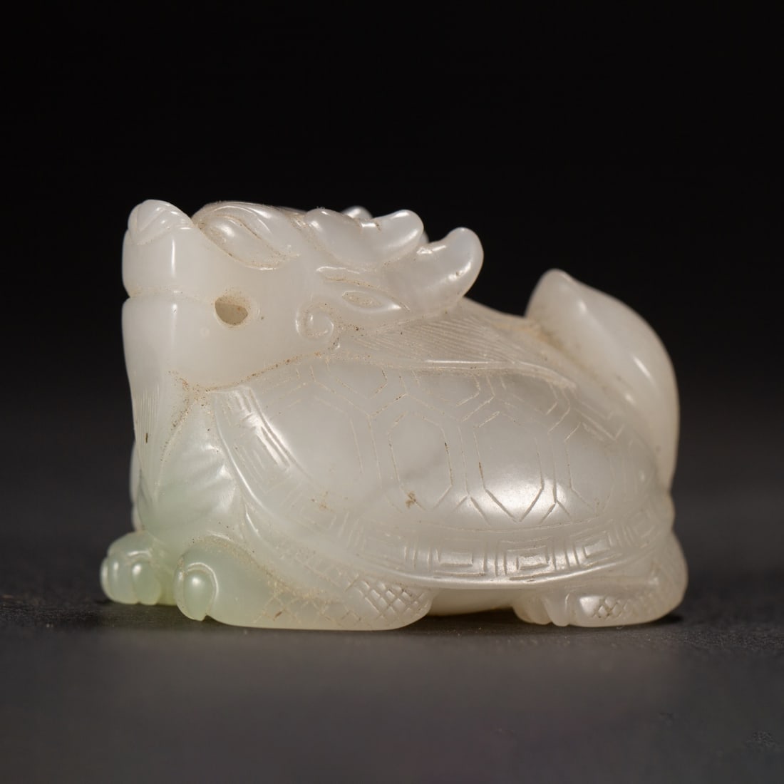 A Exquisite Hotan Jade Black Tortoise Ornament: A Exquisite Hotan Jade Black Tortoise Ornament,Qing Dynasty, China,Size:2inx1.4inx1.6in,Weight:90g 和田玉玄武摆件,中国清代