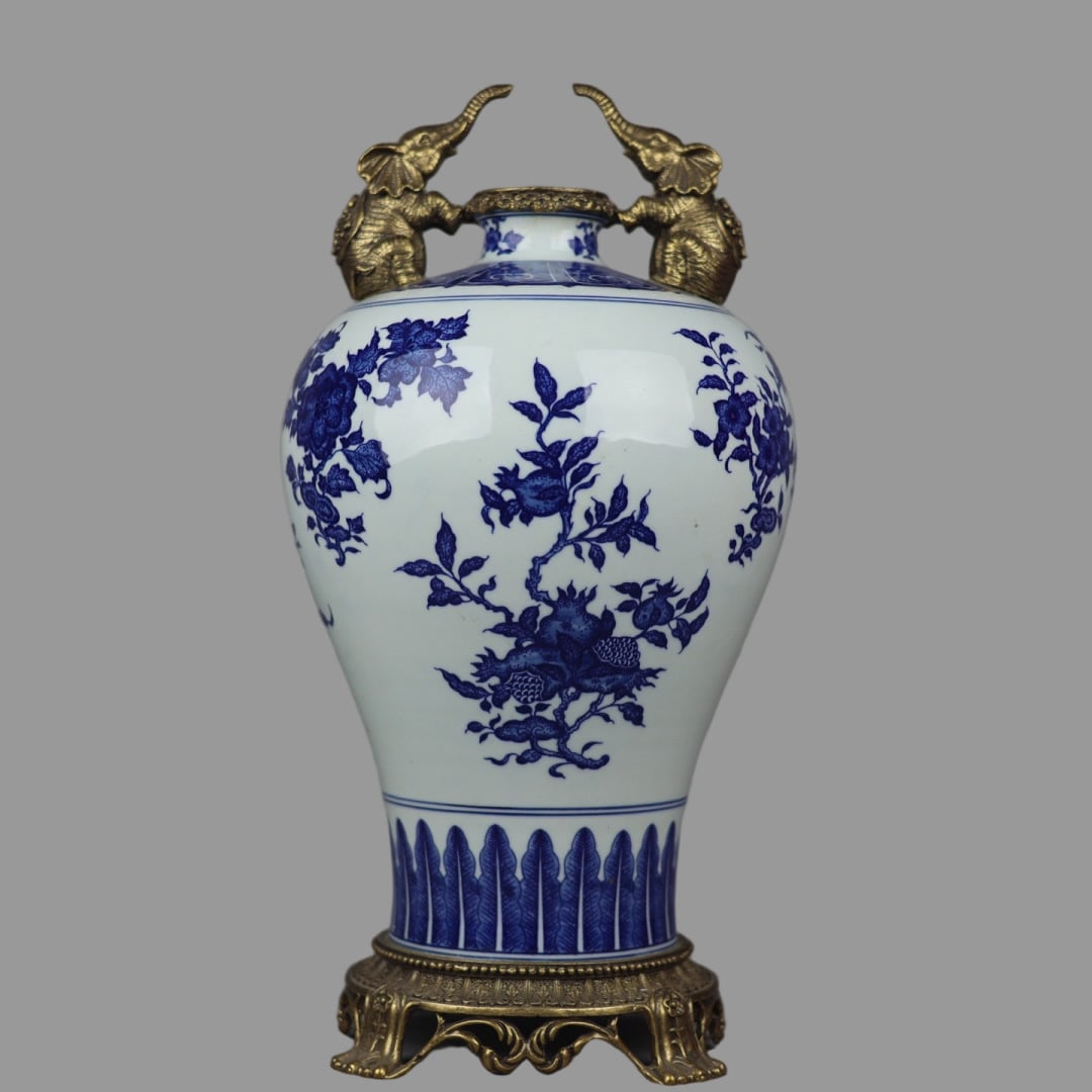 A Exquisite Blue and White Copper Inlay Flower and Fruit Pattern Elephant Ears Vase: A Exquisite Blue and White Copper Inlay Flower and Fruit Pattern Elephant Ears Vase,Qing Dynasty, China,Qianlong Six-character Mark,Size:16.5inx2.8inx8.3inx6.7in