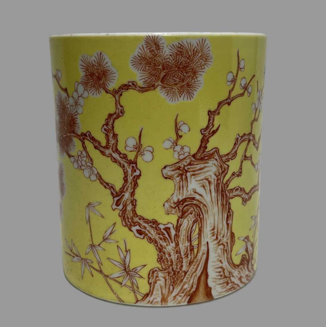 A Exquisite Famille-Rose Yellow Ground Pine and Bamboo Pattern Brush Pot (1 of 8)