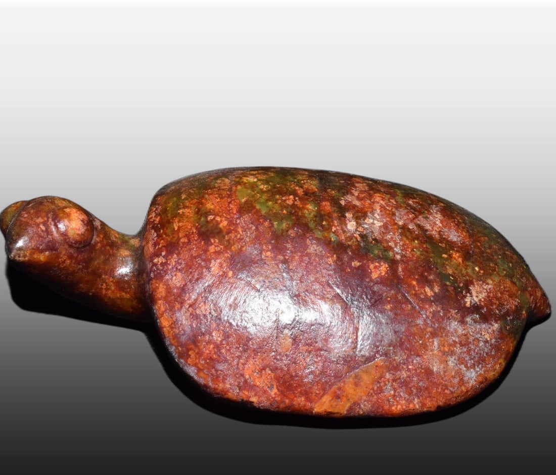 A Exquisite Gaogu Jade Tortoise Ornament: A Exquisite Gaogu Jade Tortoise Ornament,Ancient Time, China,Size:5.1inx3.3in,Weight:520g 高古玉龟摆件,远古时期
