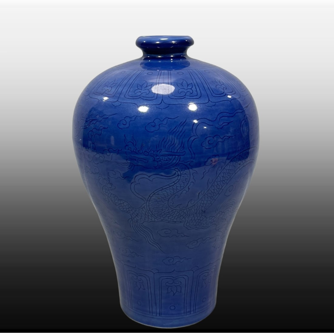 A Exquisite Ji Blue Glazed Dragon Pattern Vase: A Exquisite Ji Blue Glazed Dragon Pattern Vase,Ming Dynasty, China,Zhengde Four-character Mark,Size:12.2inx7.1in 霁蓝釉龙纹瓶,中国明代,Ē