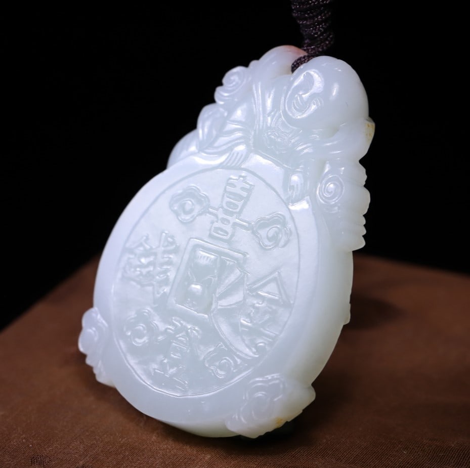 A Exquisite Hotan Jade Coin-Shaped Pendant (1 of 9)