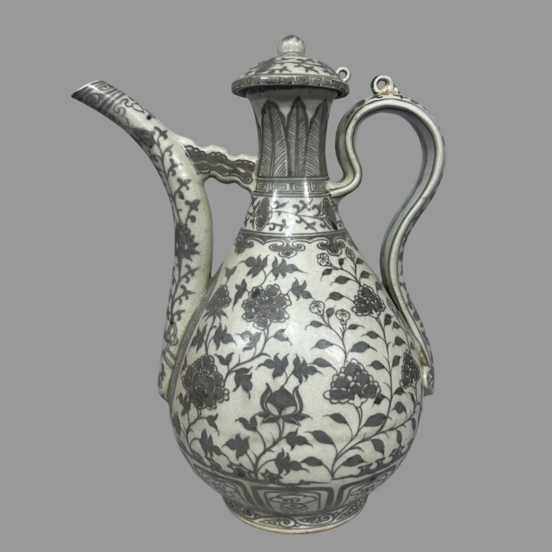 A Exquisite Underglaze-Red Lotus Pattern Ewer: A Exquisite Underglaze-Red Lotus Pattern Ewer,Ming Dynasty, China,Size:10.2inx13.4in 釉里红缠枝莲纹壶,中国明代