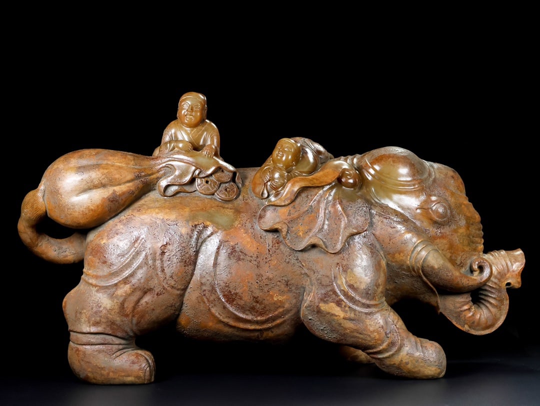 A Exquisite Hotan Jade Elephant Ornament: A Exquisite Hotan Jade Elephant Ornament,Han Dynasty, China,Size:24.4inx7.9inx13.8in,Weight:45000g 和田玉象摆件,中国汉代