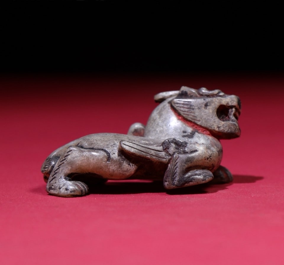 A Exquisite Hetian Jade Auspicious Beast Ornament: A Exquisite Hetian Jade Auspicious Beast Ornament,Ancient Time, China,Size:2.6inx1.3inx1.5in,Weight:74g 和田玉瑞兽摆件,远古时期