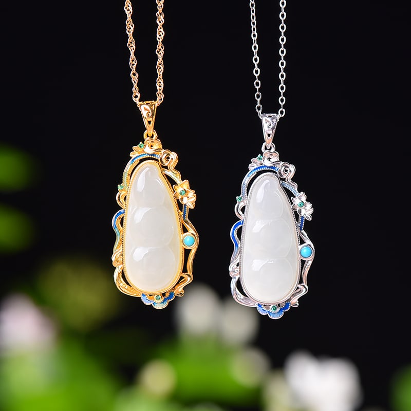 A pair of Exquisite Silver-Inlaid Hotan Jade Flower Pendant: A pair of Exquisite Silver-Inlaid Hotan Jade Flower Pendant,Size:0.4inx1in,0.4inx1in 一对银镶嵌和田玉花卉吊坠