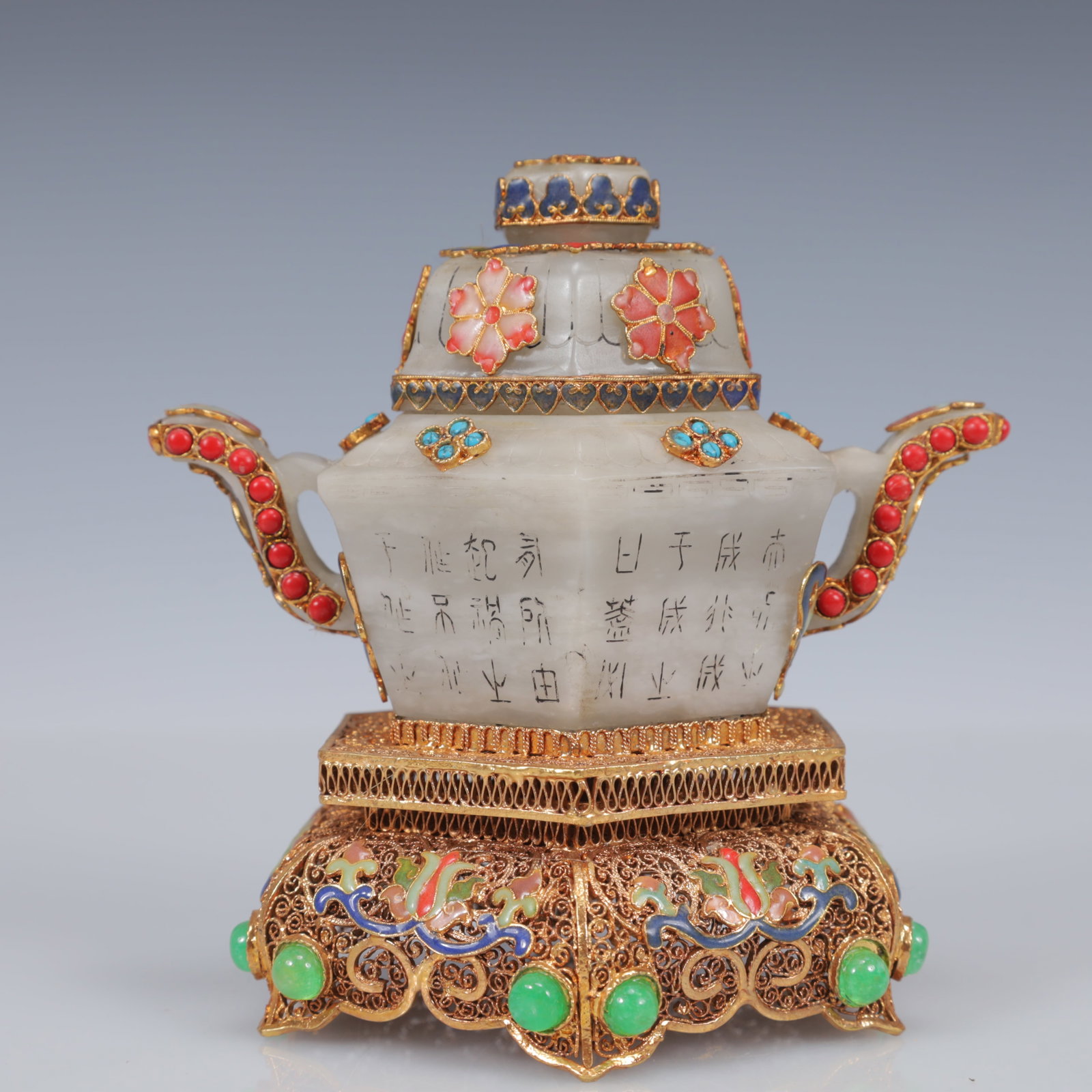 An Exquisite Filigree and Gilding Inlaid White Jade Poem Double-Ears Censer,Inlaid Gems: Estimated Value:2400-4800 An Exquisite Filigree and Gilding Inlaid White Jade Poem Double-Ears Censer,Inlaid Gems,Qing Dynasty, China,Qianlong Four-Character Mark,Size:5.5inx4.3inx5.5in,Weight:600g