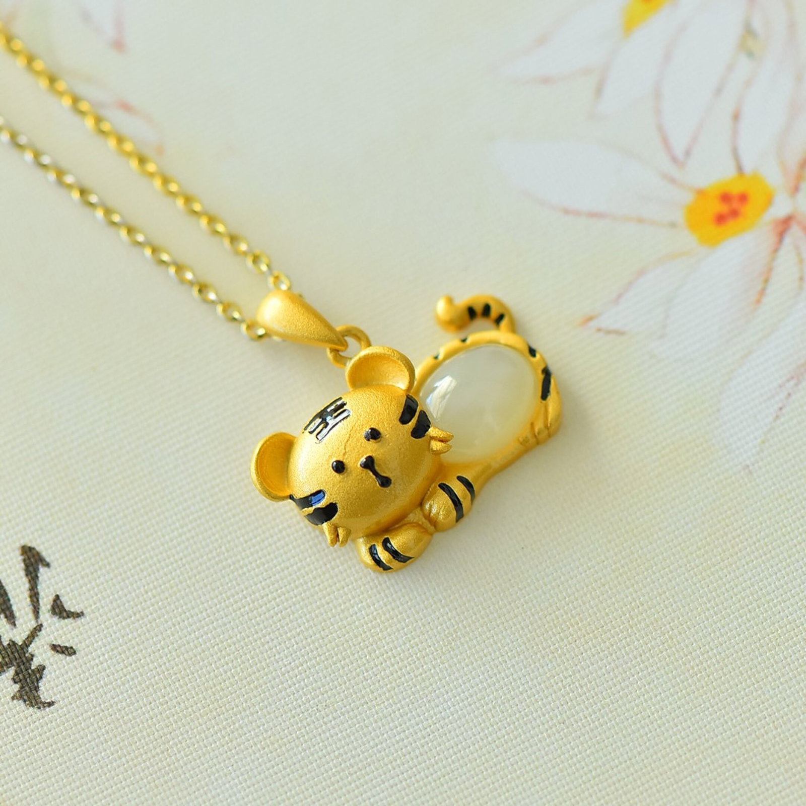 An Exquisite Sterling Silver-Gold Plated Inlaid White Jade Pendant: Estimated Value:200-400 An Exquisite Sterling Silver-Gold Plated Inlaid White Jade Pendant,Size:7mmx9mm 纯银镀金镶白玉吊坠