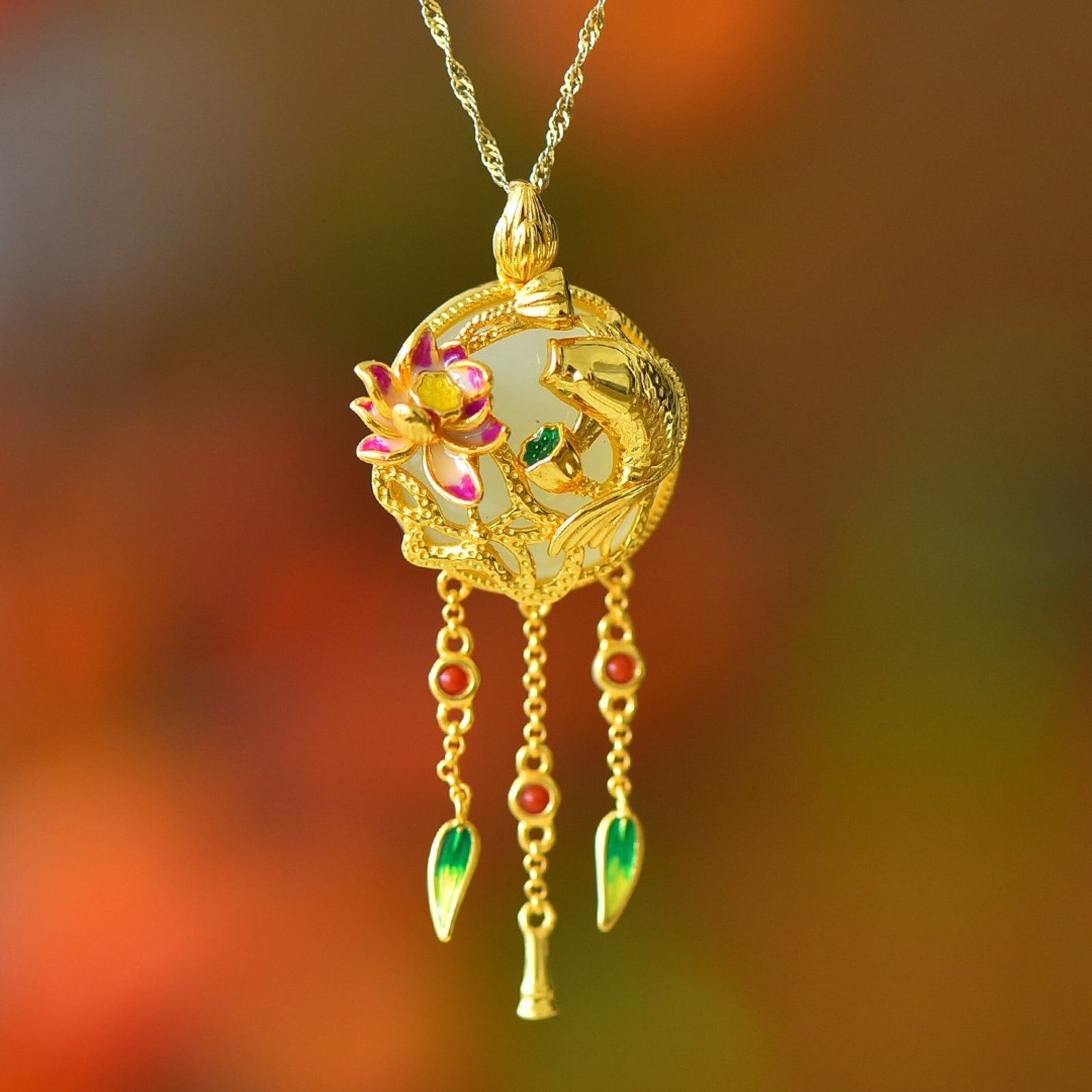 An Exquisite Sterling Silver-Gold Plated Inlaid White Jade Pendant: Estimated Value:400-800 An Exquisite Sterling Silver-Gold Plated Inlaid White Jade Pendant 纯银镀金镶白玉吊坠
