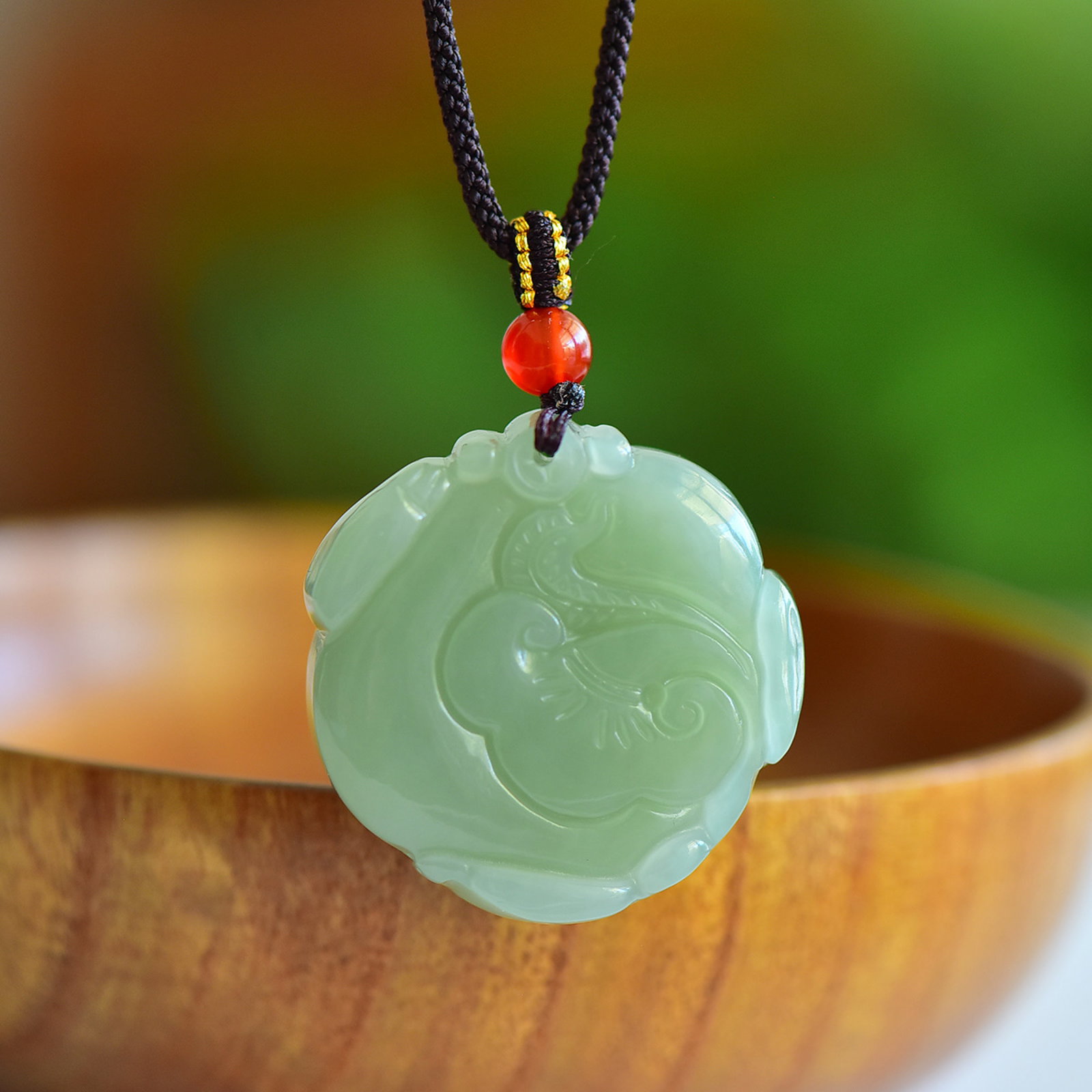 An Exquisite Greenish Jade Auspicious Beast Pendant - 2