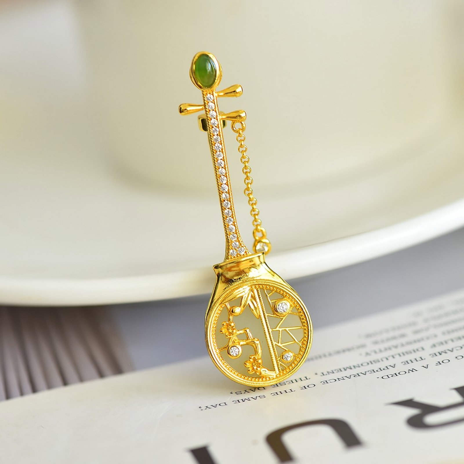 An Exquisite Sterling Silver-Gold Plated Inlaid White Jade Brooch,Inlaid Diamonds and Jasper: Estimated Value:300-600 An Exquisite Sterling Silver-Gold Plated Inlaid White Jade Brooch,Inlaid Diamonds and Jasper,Size:16mmx16mm