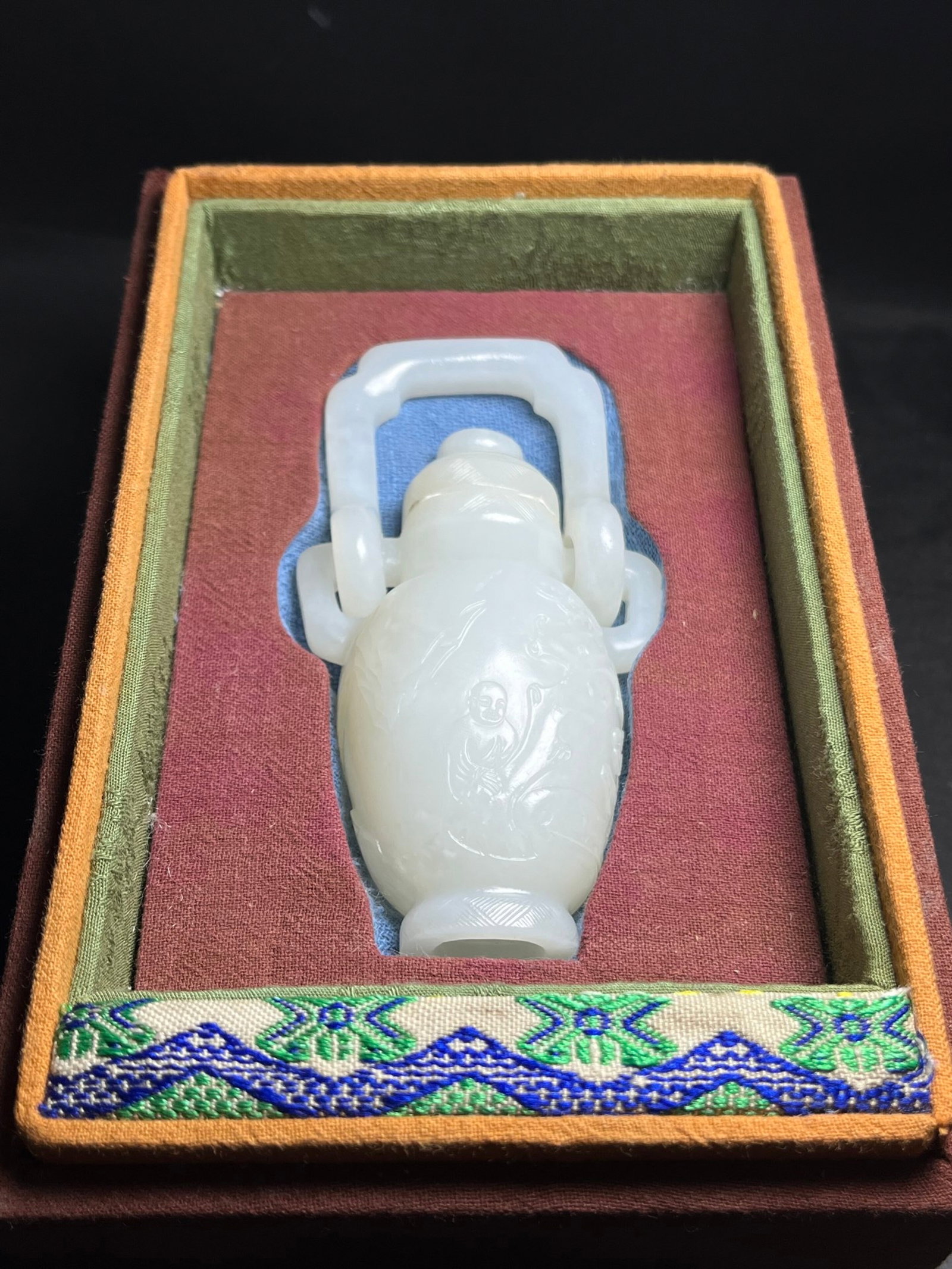 An Exquisite White Jade Landscape and Figure Pattern Double-Ears Bottle: Estimated Value:3400-6800 An Exquisite White Jade Landscape and Figure Pattern Double-Ears Bottle,Qing Dynasty,China,Size:110mmx36mmx57mm,Weight:152g
