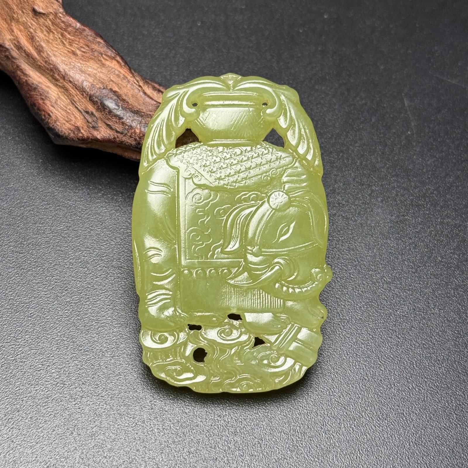 An Exquisite Yellow Jade Elephant Pattern Pendant: Estimated Value:760-1600 An Exquisite Yellow Jade Elephant Pattern Pendant,Qing Dynasty,China,Size:61mmx38mmx6mm,Weight:29g
