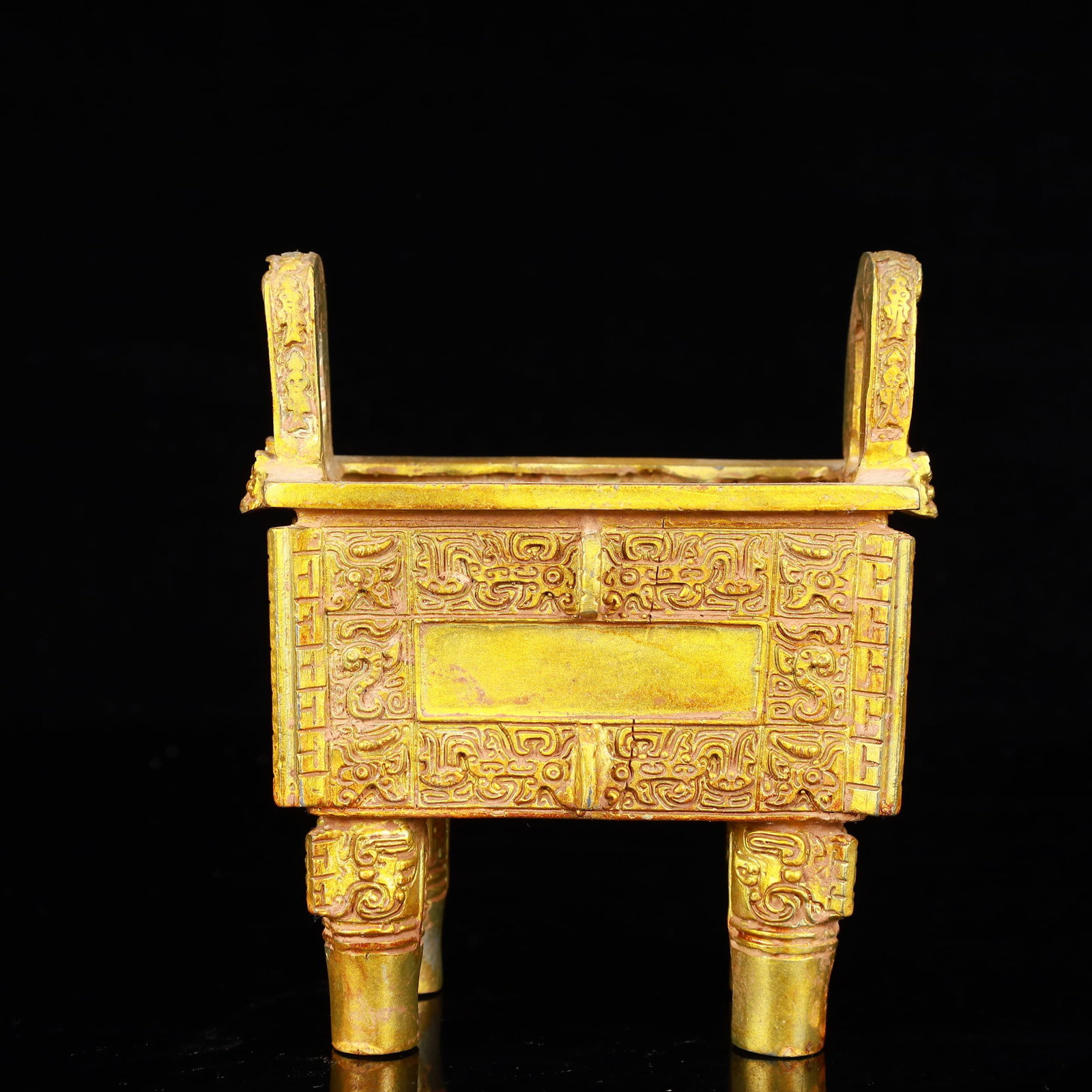 A Rare Gilt Bronze Double-Ears Ding: Estimated Value:1600-3200 A Rare Gilt Bronze Double-Ears Ding,The Warring States period in China,Size:4.7inx3.3inx5.9in,Weight:900g