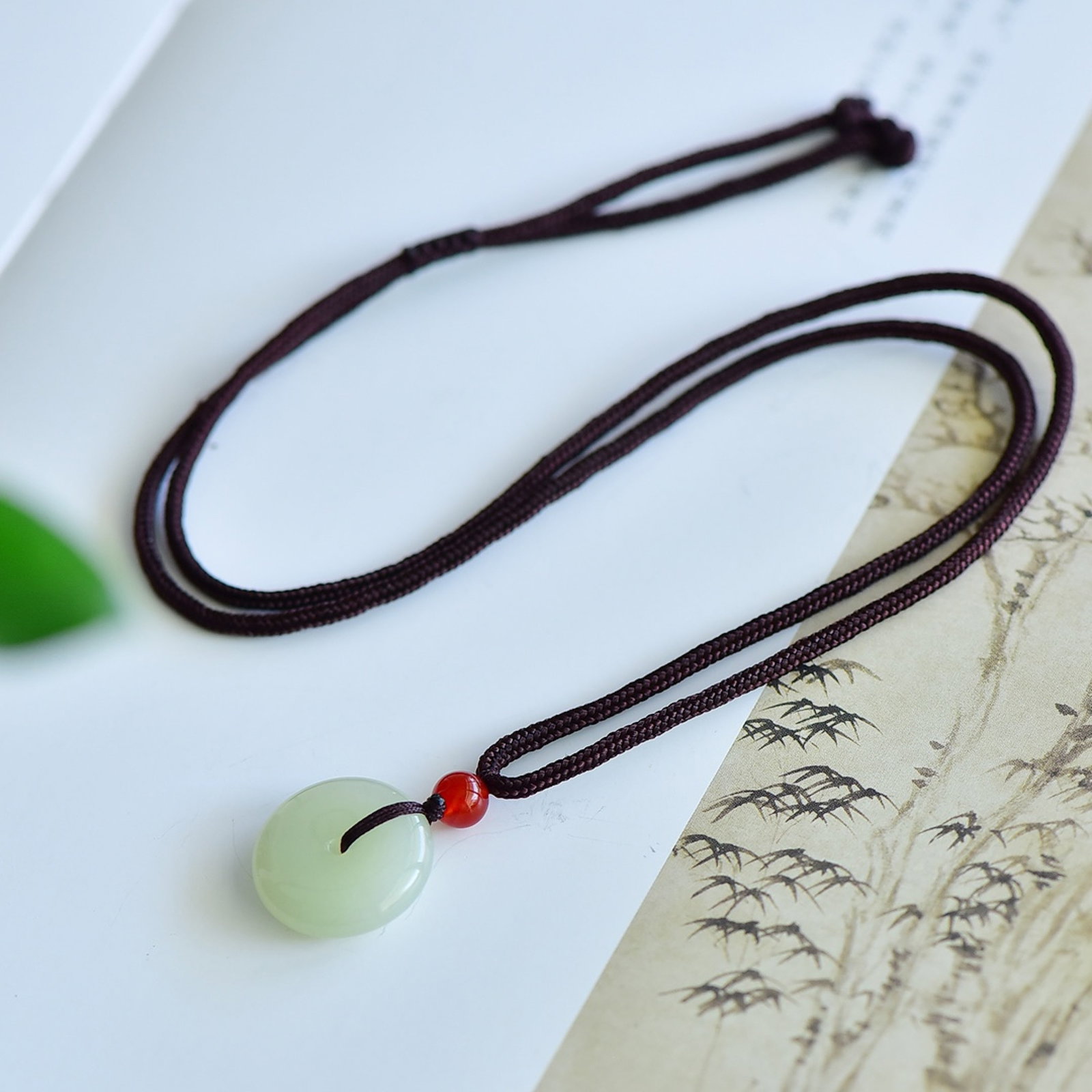 An Exquisite Greenish Jade Pendant: Estimated Value:200-400 An Exquisite Greenish Jade Pendant,Size:18mmx21mm 青白玉吊坠