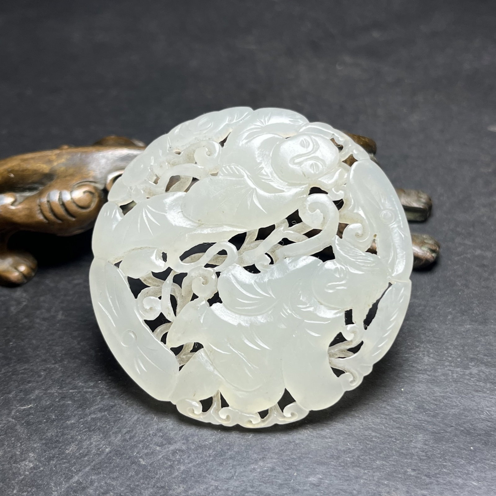 An Exquisite White Jade Hollow Landscape and Figure Pattern Pendant: Estimated Value:400-800 An Exquisite White Jade Hollow Landscape and Figure Pattern Pendant,Qing Dynasty,China,Size:52mmx5mm,Weight:21g