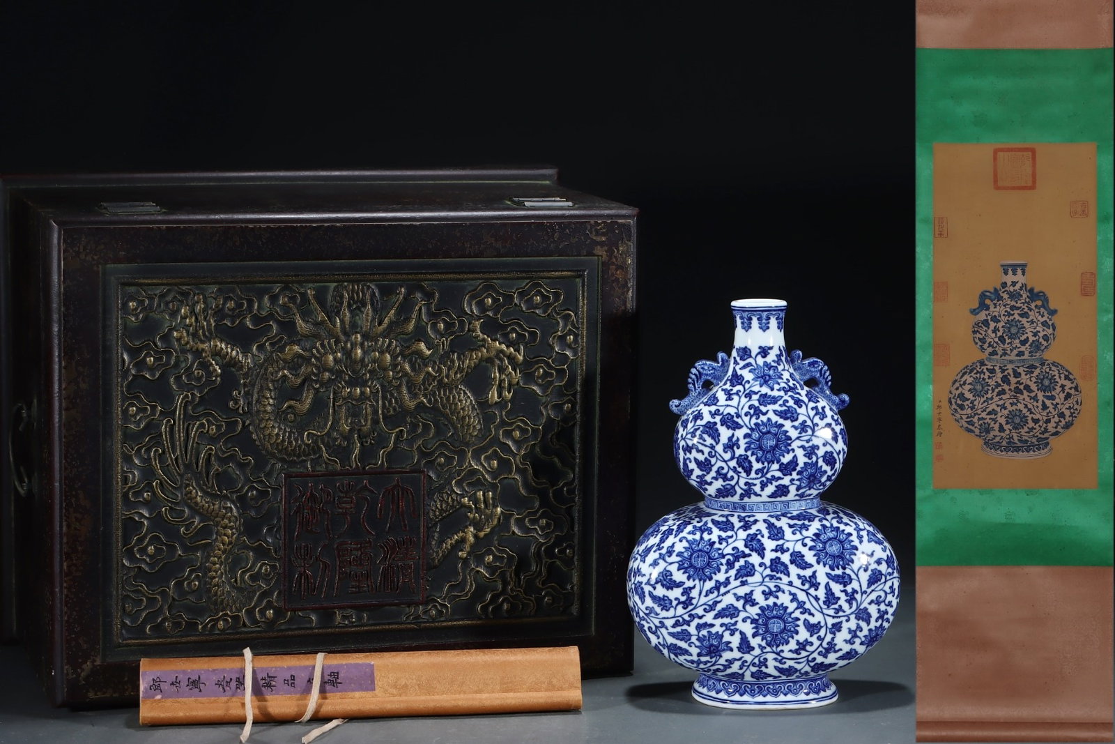 A Rare Blue and White Lotus Pattern Double-Ears Gourd Vase,With Vertical Scroll Painting on Silk: Estimated Value:8000-16000 A Rare Blue and White Lotus Pattern Double-Ears Gourd Vase,With Vertical Scroll Painting on Silk,Qing Dynasty, China,Qianlong Six-character Mark,Size:13.3inx9in,(Without