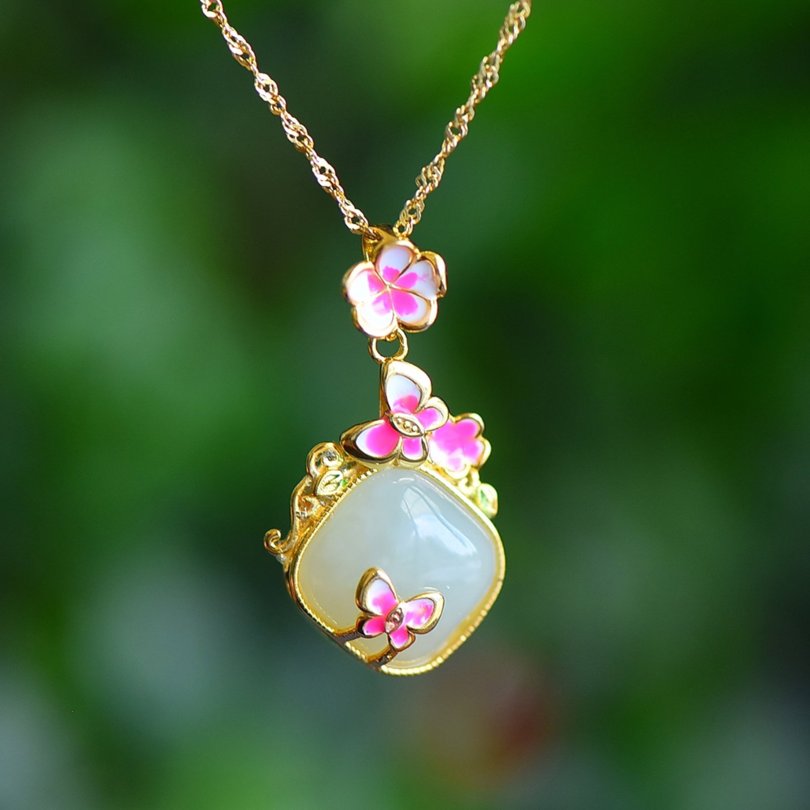 An Exquisite Sterling Silver-Gold Plated Inlaid White Jade Enamel Pendant: Estimated Value:200-400 Sterling Silver-Gold Plated Inlaid White Jade Enamel Pendant , Size :12mmx12mm
