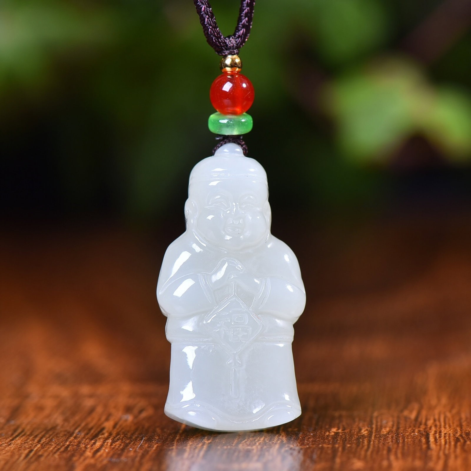 An Exquisite White Jade Figure Pendant: Estimated Value:200-400 An Exquisite White Jade Figure Pendant,Size:38mmx20mm (寓意)招财进宝 寓意吉祥