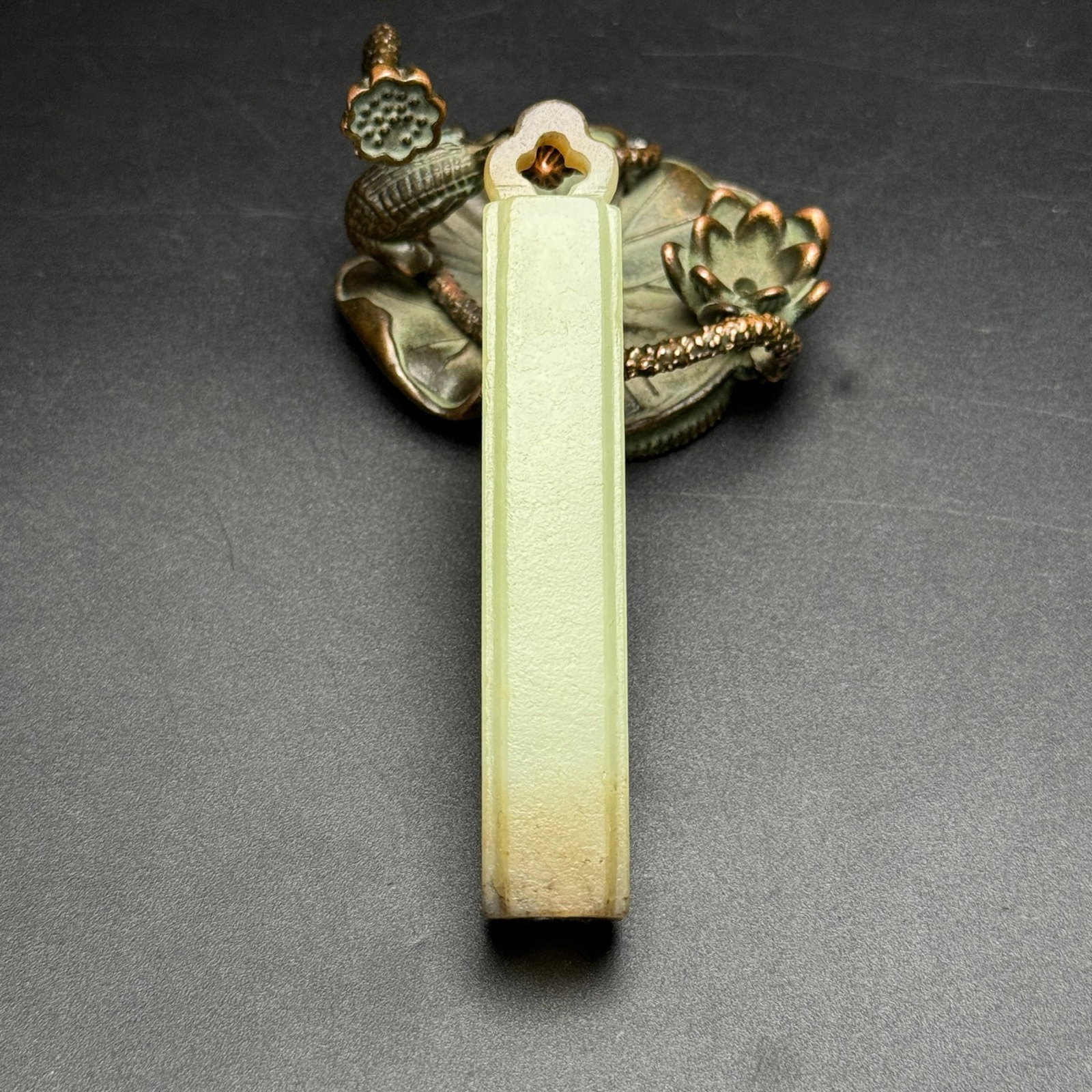 An Exquisite White Jade Pendant: Estimated Value:800-1600 An Exquisite White Jade Pendant,Qing Dynasty,China,Size:14mmx81mmx14mm,Weight:34g 白玉挂件,中国清代