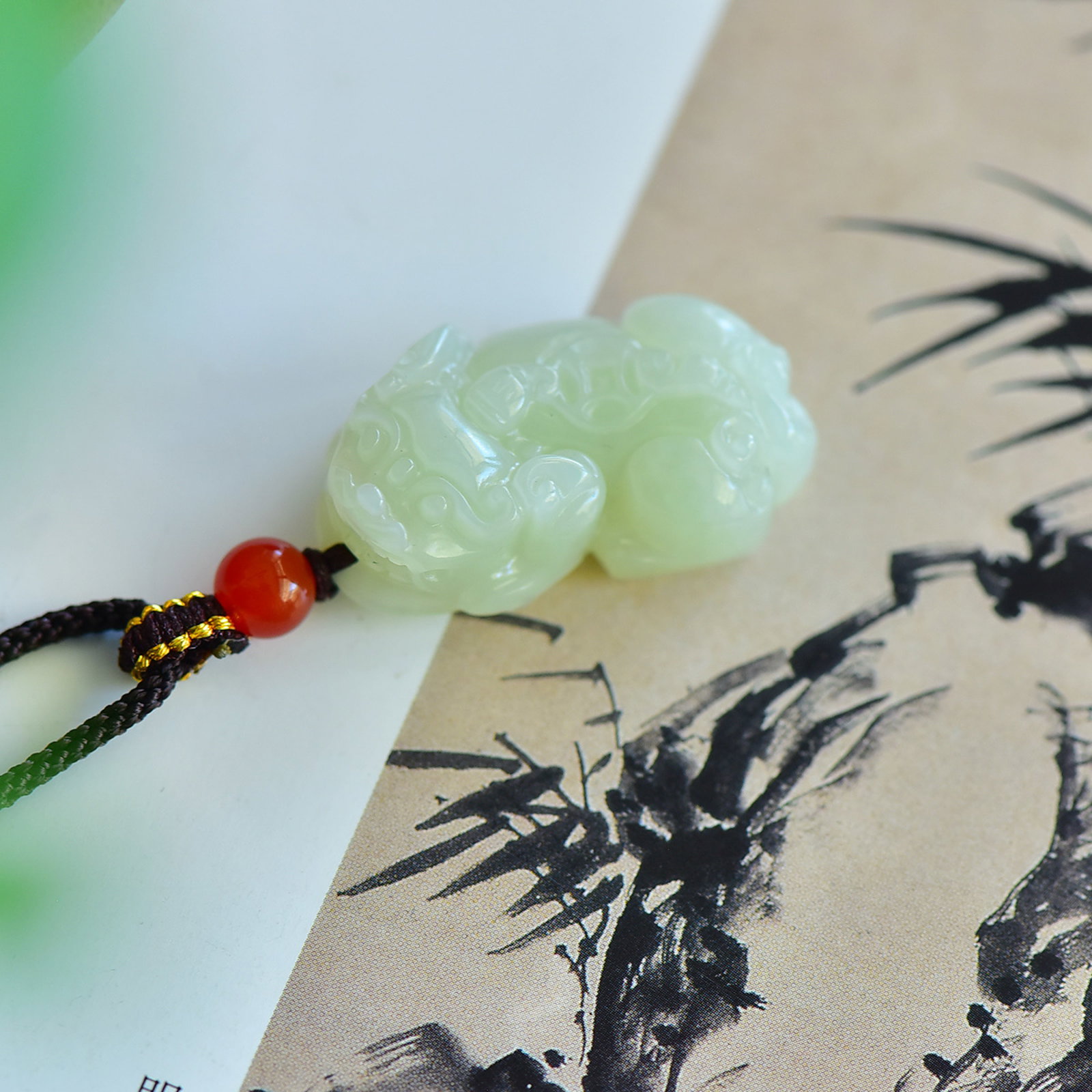 An Exquisite Greenish Jade Auspicious Beast Pendant - 2