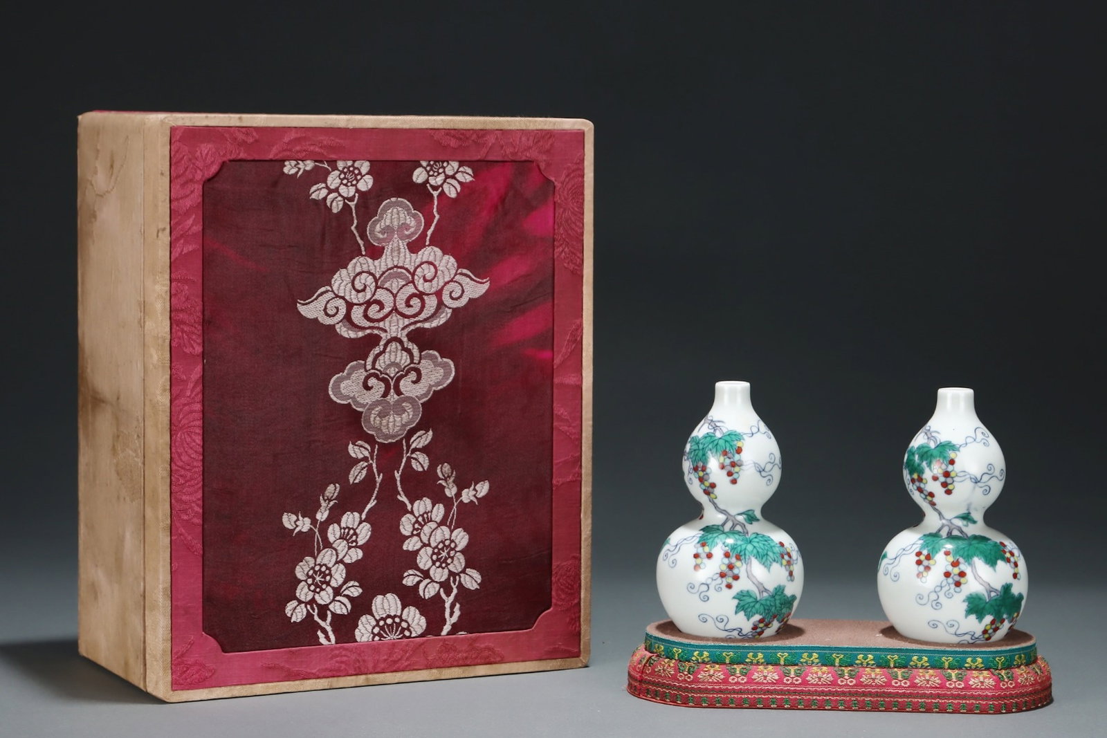 A Pair of Exquisite Blue and White Doucai Squirrel and Grapes Pattern Gourd Vases: Estimated Value:2000-4000 A Pair of Exquisite Blue and White Doucai Squirrel and Grapes Pattern Gourd Vases,Qing Dynasty,China,Yongzheng Six-character Mark,Size:5.1inx2.9in