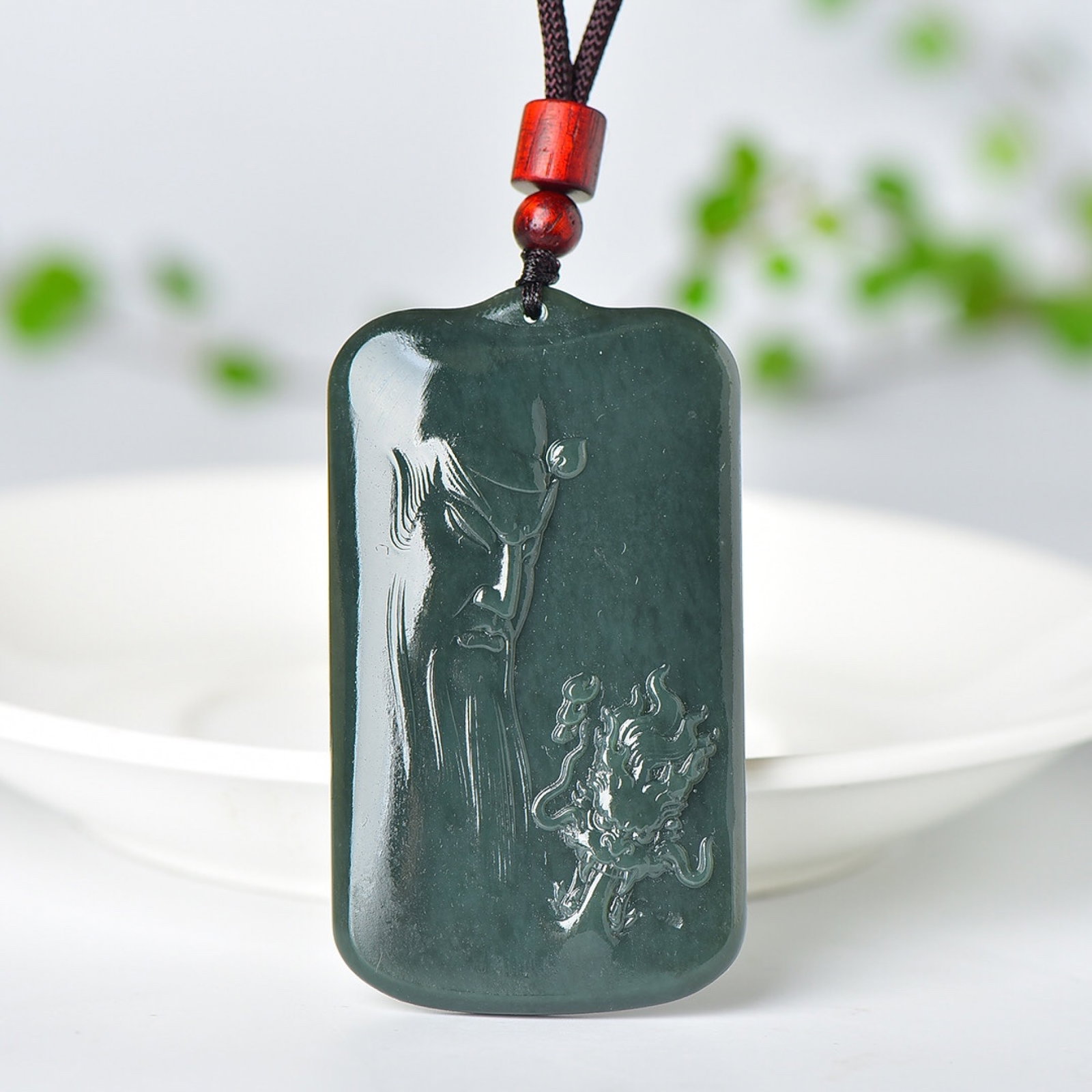 An Exquisite Sapphire Guangong Pattern Pendant: Estimated Value:300-600 An Exquisite Sapphire Guangong Pattern Pendant,Size:39mmx68mm (寓意)寓意吉祥 招财纳福
