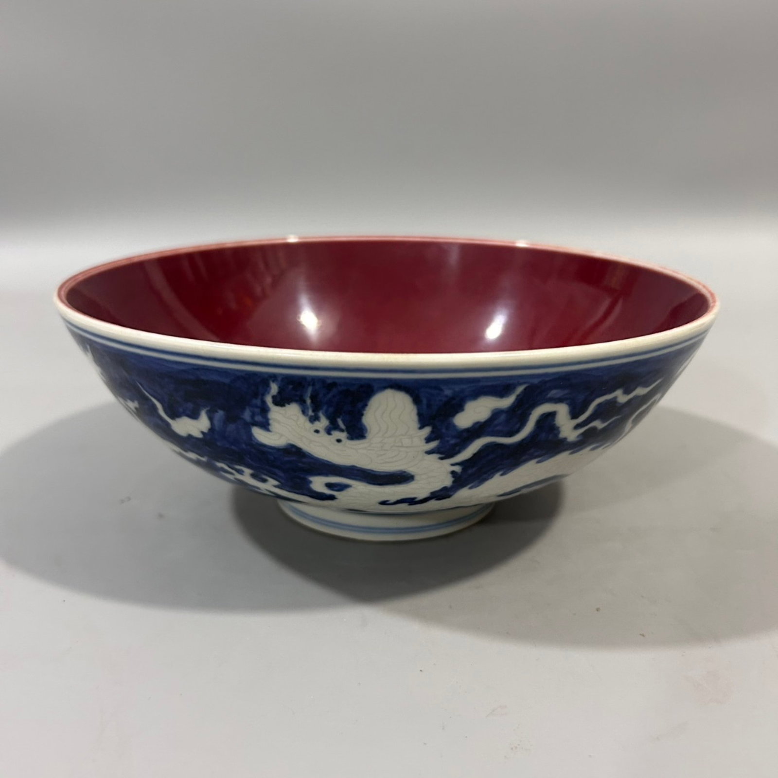 An Exquisite Blue Ground Ji Red Glazed Auspicious Cloud and Dragon Pattern Bowl: Estimated Value:880-1800 An Exquisite Blue Ground Ji Red Glazed Auspicious Cloud and Dragon Pattern Bowl,Ming Dynasty,China,Xuande Six-character Mark,Size:3.1inx8.3in