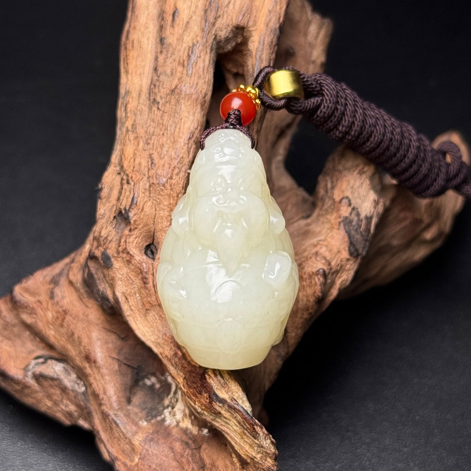 An Exquisite White Jade Statue of Mammon Pendant: Estimated Value:360-800 An Exquisite White Jade Statue of Mammon Pendant,Qing Dynasty,China,Size:40mmx24mmx22mm,Weight:34g