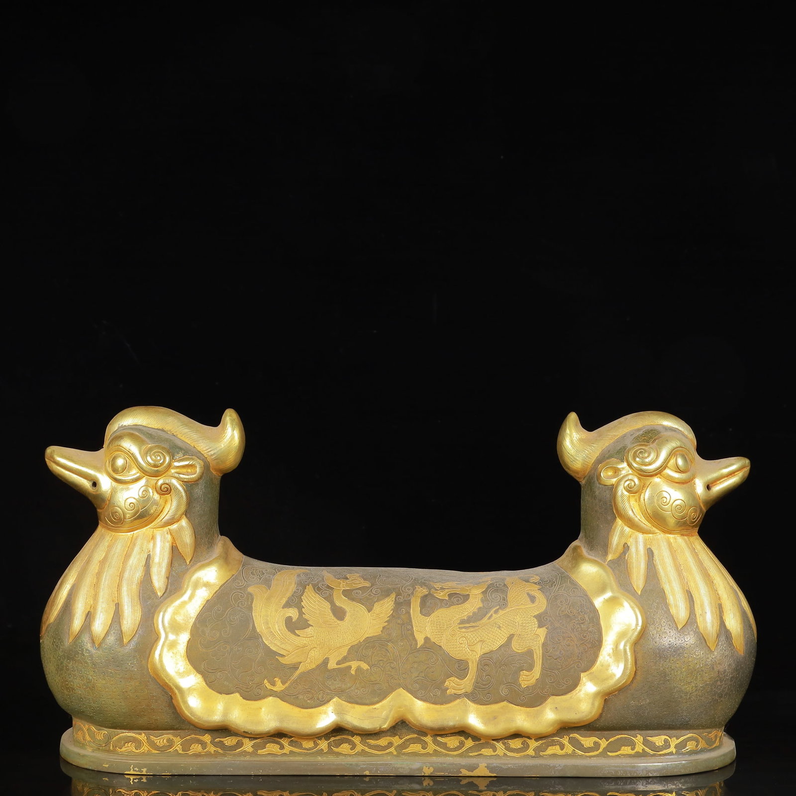 An Exquisite Gilt Silver Dragon and Phoenix Pattern Auspicious Beast Ornament: Estimated Value:2400-4800 An Exquisite Gilt Silver Dragon and Phoenix Pattern Auspicious Beast Ornament,Tang Dynasty,China,Zhenguan Four-Character Mark,Size:15inx4.3inx7.5in,Weight:3100g
