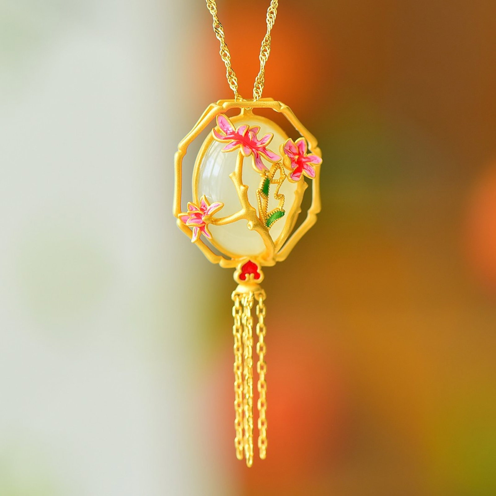 An Exquisite Sterling Silver-Gold Plated Inlaid White Jade Enamel Pendant: Estimated Value:300-600 An Exquisite Sterling Silver-Gold Plated Inlaid White Jade Enamel Pendant,Size:15mmx20mm