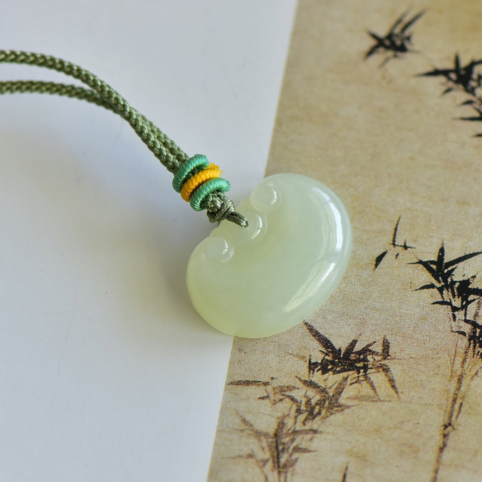 An Exquisite Greenish Jade Pendant - 2