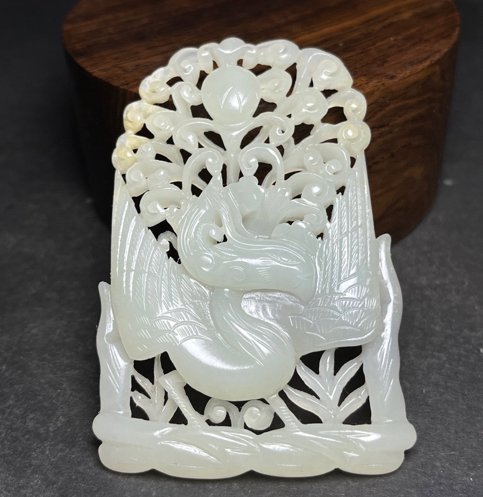 An Exquisite White Jade Hollow Phoenix Pattern Pendant: Estimated Value:1200-2400 An Exquisite White Jade Hollow Phoenix Pattern Pendant,Qing Dynasty,China,Size:79mmx8mmx53mm,Weight:44g 白玉镂空凤纹挂件,È