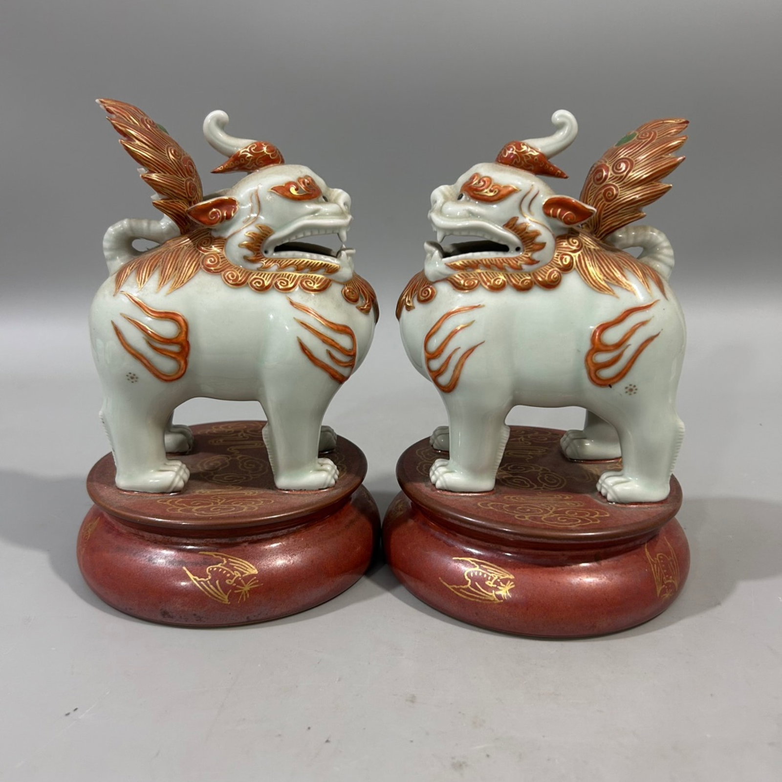 A Pair of Exquisite White Glazed Famille-Rose Painted Gold Kylin Ornaments: Estimated Value:3200-6400 A Pair of Exquisite White Glazed Famille-Rose Painted Gold Kylin Ornaments,Qing Dynasty,China,Qianlong Six-character Mark,Size:3.9inx7.1in