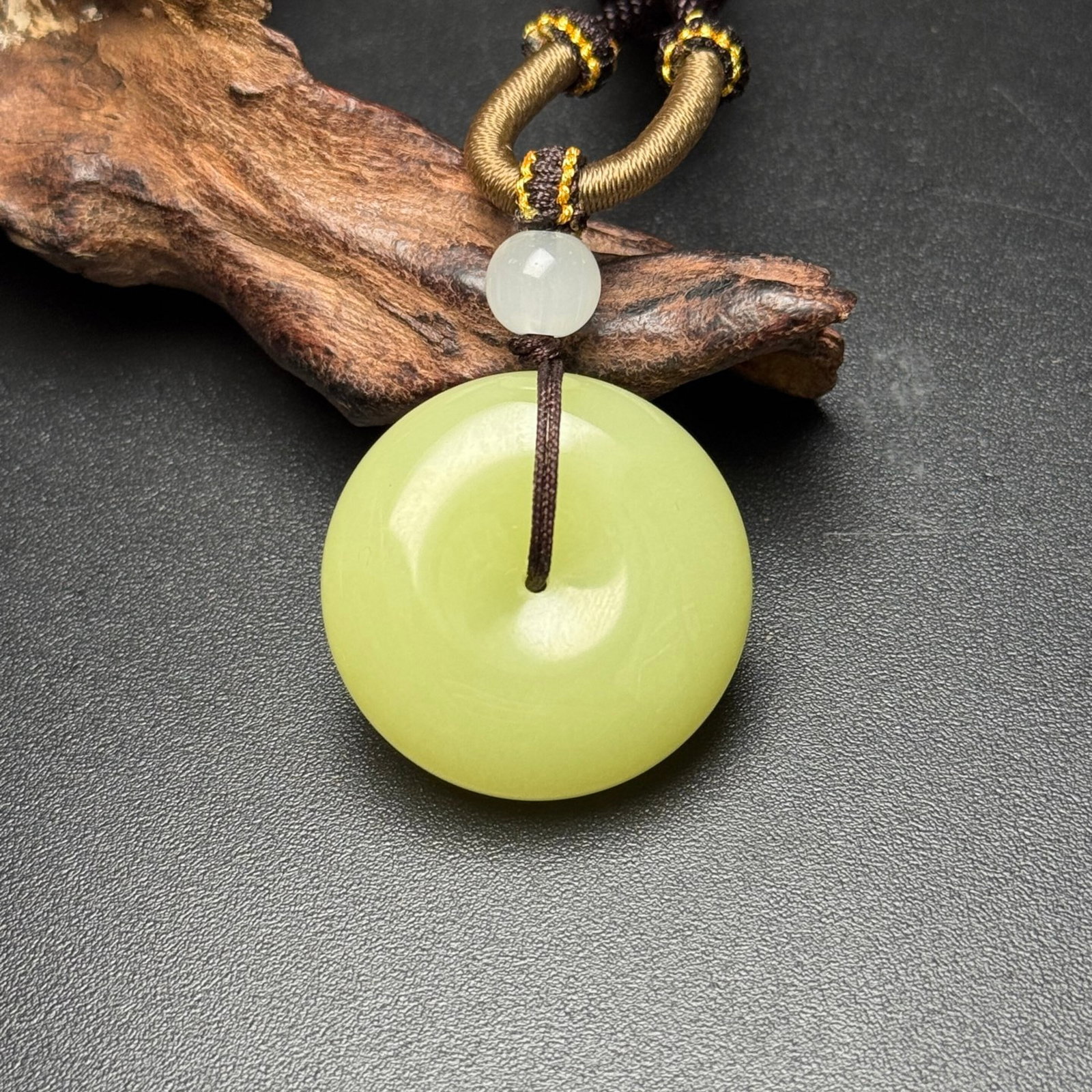 An Exquisite Yellow Jade Pendant: Estimated Value:680-1400 An Exquisite Yellow Jade Pendant,Qing Dynasty,China,Size:31mmx12mm,Weight:27g 黄玉挂件,中国清代