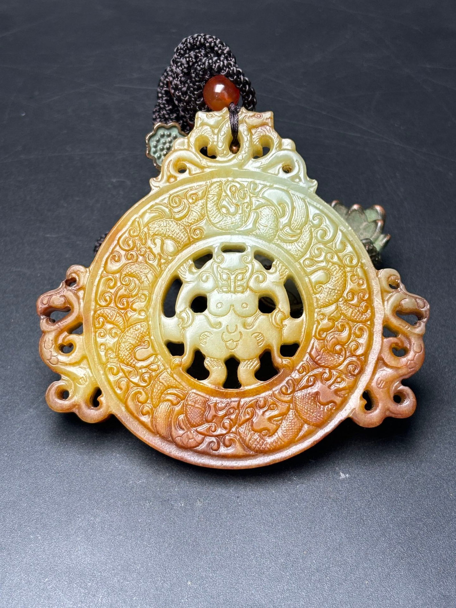 An Exquisite White Jade Dragon and Phoenix Pattern Pendant: Estimated Value:650-1300 An Exquisite White Jade Dragon and Phoenix Pattern Pendant,Qing Dynasty,China,Size:85mmx79mmx8mm,Weight:83g